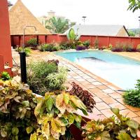 Appartement de 2 chambres avec piscine partagee jardin clos et wifi a Porto Novo, hotel in Porto-Novo