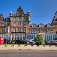a large building with cars parked in front of it at Muthu Alexandra Hotel, Oban