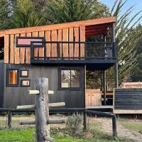 Preciosa mini-casa-bote bien ubicada y linda vista, hotel em Buchupureo