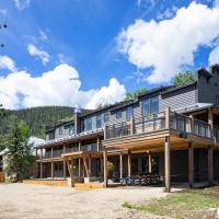 a large house with a lot of windows at Vaquera House, Crested Butte