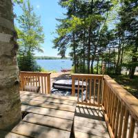 a wooden deck with a view of the water at Leland’s Lakehouse, Wolfville