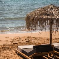 Ammos Suite-Grand Blue Beach Residence, хотел в Ликсури