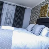 Delux Guesthouse, hotel Volksrust városában