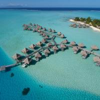 an aerial view of a resort in the ocean at InterContinental Bora Bora Le Moana Resort, an IHG Hotel
