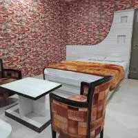 Golden Park Inn โรงแรมในJarmundi