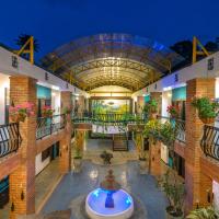a large building with arium with a ceiling at Hotel Salento Real Eje Cafetero