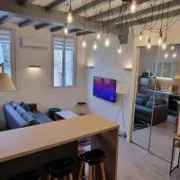 Appart climatisé le Rétro Chic - Entièrement rénové en hyper centre - Terrasse et Parking privé, hótel í La Roche-Chalais