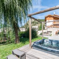 Luxury Chalet with outdoor Hot Tub, Sauna, Gardens & Mountain Views!