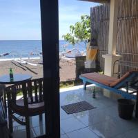 Tambun Sari Beach Homestay, хотел в Амед