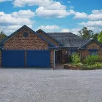 Lilly Pilly Lodge, hotel en Wallalong
