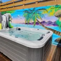 Courcelles में, होटल "Chez Claudia "charmant logement avec jacuzzi privatif en toute intimité sur belle terrasse extérieure en bois et piscine
