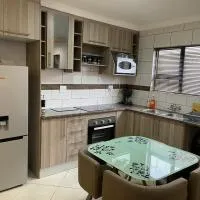 Cozy Inn, hotell i Tikoe