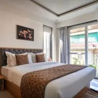 Drizzle Resort with Swimming pool Near Maapro Garden，馬哈巴萊斯赫瓦爾的飯店