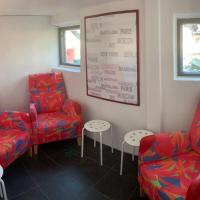 a waiting room with two chairs and two tables at Omakotitalo, Raisio (near Meyer gate)