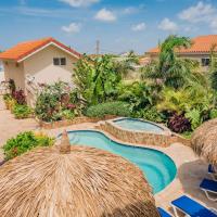Dream Suites Aruba 4-bedroom apartment with tropical garden, pool and jacuzzi, hotel in Eagle Beach