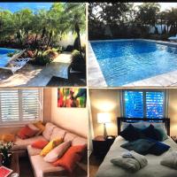 Private bedroom & den suite with shared pool & tropical garden