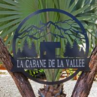 a sign that reads la cabana de la valle at la Cabane de la Vallee, Dumbéa