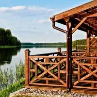 Domki Mazurskie w Ogrodach Złotej Łani Wiartel - Klimatyczne Apartamenty i Pokoje Widokowe, hotel em Wiartel