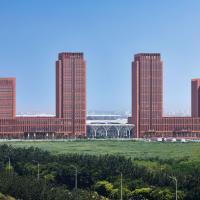 Four Points by Sheraton Tianjin National Convention and Exhibition Center, отель в Тяньцзине, в районе Jinnan