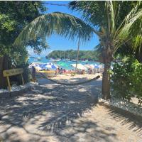 Praia dos Ossos Guest House - B&uacute;zios com p&eacute; na areia &ndash; hotel w mieście B&uacute;zios