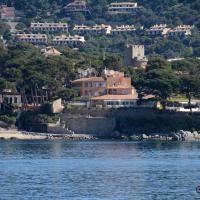 a town on the shore of a body of water at Hotel La Torre, Calella de Palafrugell