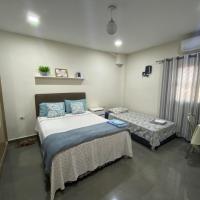 Agradable dormitorio en suite con estacionamiento privado, hotel cerca de Aeropuerto Internacional Guaraní - AGT, Ciudad del Este