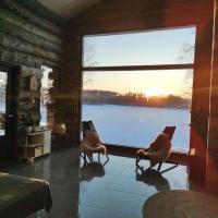Upea kelohirsihuvila rannalla, myös poreamme!, hotel poblíž Letiště Joensuu - JOE, Joensuu