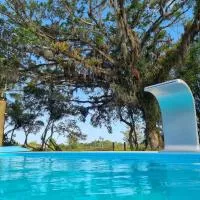 Sítio com piscina Hidromassagem com acesso ao Rio Mampituba, hotel v mestu Passo de Torres