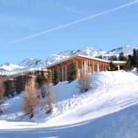 a log cabin in the snow with snow at L'Aiguille Grive Chalets Hotel, Arc 1800