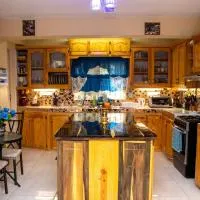PRI Guest House โรงแรมในArnos Vale