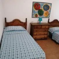habitación en un bajo 2 camas individual casa compartida, hotel u gradu Abades