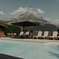 Hôtel Les Roches Fleuries، فندق في كوردون