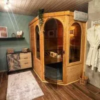 L’Écho des Bois - Studio cocooning avec sauna, hotel i L'Abergement