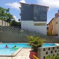 CASA DUPLEX no FORTE a 200m da praia, 80 m2, 3 quartos com ar condicionado, cozinha completa, 2 WC, piscinas, acomoda 12 pessoas, estacionamento, área de lazer, WIFI, portaria 24H, ambiente familiar., hotel a Itamaracá