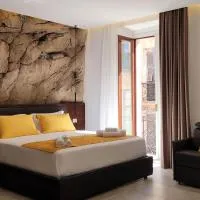 Palazzo Ferrucci Luxury Suites โรงแรมในกาญารี