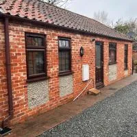 The Old Stables in Mews, hótel í Kessingland