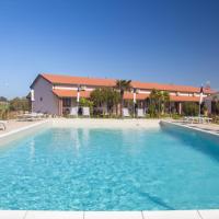 Delfino Tuscany Resort, отель в Марина-ди-Чечина