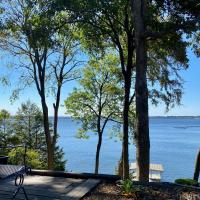 a view of the water from the deck of a house at Newly Renovated 4B, 2.5 bath Lakefront home with South Grand Lake Views and dock, Vinita