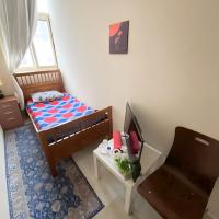 MBZ - Relax Room in Unique Flat，阿布達比阿爾達夫來機場 - DHF附近的飯店