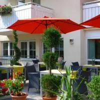 Hotel Im Winkel Appartements und Zimmer โรงแรมในลังเงนาร์เงน