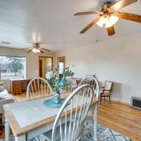 a dining room and living room with a ceiling fan at Pet-Friendly Torrington Vacation Rental Near River
