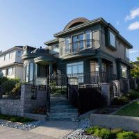 South Vancouver home 15mins from airport/20mins from DT โรงแรมที่Fraserviewในแวนคูเวอร์