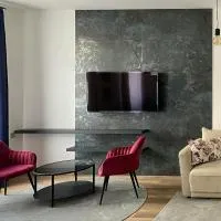 Corner Apartman โรงแรมในคือแซก