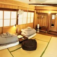 奄美ゲストハウス HUB a nice INN, отель в городе Setouchi