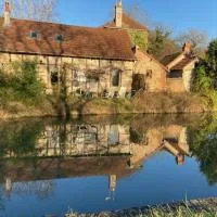 Tranquillitude au Moulin Bouquet، فندق في La Chapelle-aux-Chasses