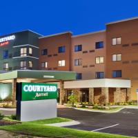 a rendering of the front of a hotel with acourt yardanu sign at Courtyard by Marriott Auburn