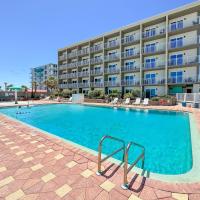 a large swimming pool in front of a building at Boardwalk Inn and Suites, Daytona Beach