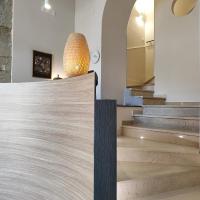 a lobby with a wooden counter top and stairs at Hotel Ideal Boutique, Naples