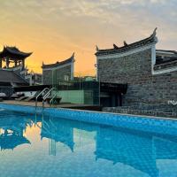 Phoenix Hall House Hotel, מלון ליד Huaihua Zhijiang Airport - HJJ, פנגואנג