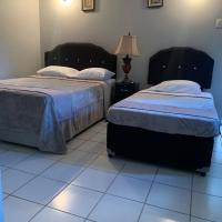 Derick's Inn, hotel near Piarco Airport - POS, Piarco